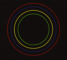 a colorful circle on a black background with the letter o in the middle