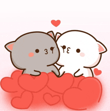 a couple of cartoon cats sitting on a pile of hearts