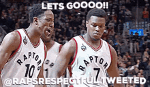 two raptors basketball players are standing next to each other on the court