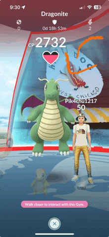 a screenshot of a pokemon game shows a dragonite with cp 2732