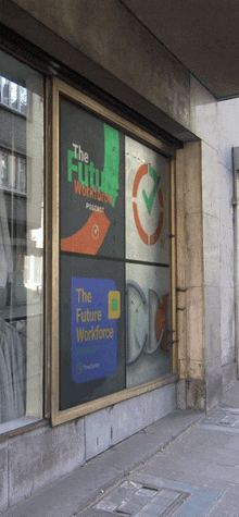 a window with a sign that says the future workforce on it