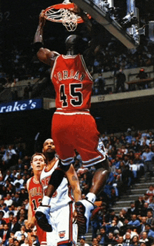 a basketball player wearing a red jersey with the number 45 on it