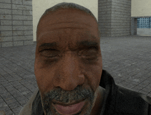 a close up of a man 's face with a brick wall in the background