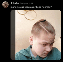 a picture of a boy with a ponytail and the caption jokshe