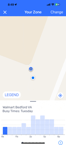 a phone screen shows a map of walmart bedford va busy times