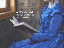 a woman in a blue dress is reading a book called a moreninha by joaquim manoel de macedo