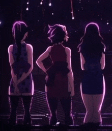 three anime girls are standing next to each other on a stage in front of a purple background .