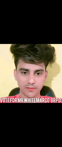 a young man is sitting in a chair with the words vote for mr white marco grpd above him