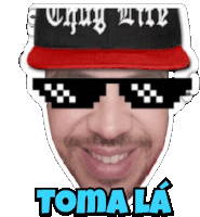 a sticker of a man wearing sunglasses and a hat that says ugly little toma la