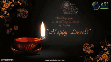 a happy diwali greeting card with a candle