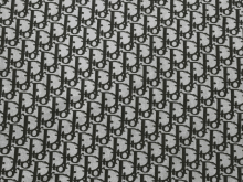 a black and white dior pattern on a white surface