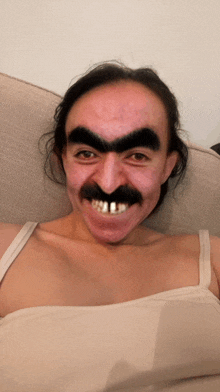 a woman with a fake mustache and eyebrows