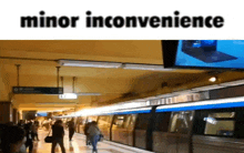 a subway station with the words minor inconvenience on the bottom