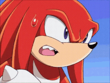 a close up of knuckles from sonic the hedgehog making a surprised face .