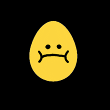 a yellow egg with a sad smiley face on it