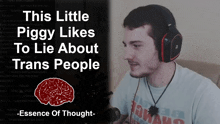 a man wearing headphones with the words " this little piggy likes to lie about trans people "