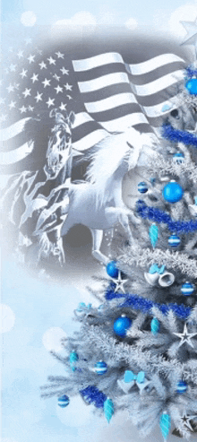 a blue and white christmas tree with a unicorn on top