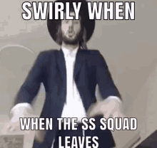 a man in a suit and hat is swirling when the ss squad leaves