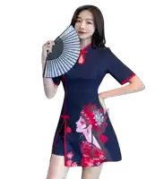 a woman in a blue dress holding a fan in her hand