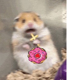 a hamster is holding a cross and a pink donut