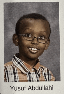 a picture of a boy with the name yusuf abdullahi on it