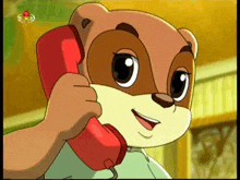 a cartoon squirrel is talking on a red telephone .