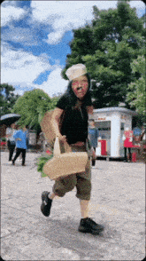 a man carrying a basket of vegetables in front of a kiosk that says ' ice world ' on it