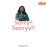 a woman in a plaid shirt says sorry sorry !!