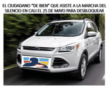 a white ford car with a sign on the front that says " el ciudadano "