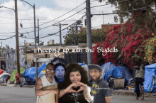 a group of people posing for a picture with the words keeping up with the slydells written above them