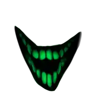 a close up of a mouth with green teeth