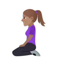 a woman in a purple shirt is kneeling down and smiling