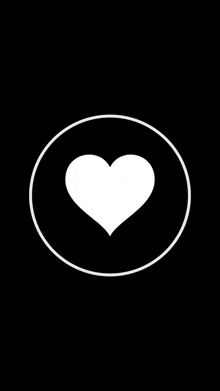 a white heart in a circle on a black background