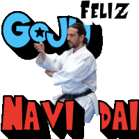 a man in a karate uniform stands in front of a sign that says feliz navi day