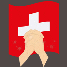 two hands folded in front of a swiss flag with a white cross on it