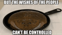 a frog in a frying pan with the words but the wishes of the people can 't be controlled below it