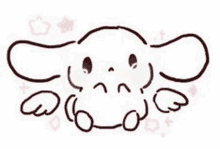 it is a drawing of a cinnamon roll with wings and a sad face .