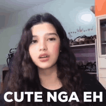 a girl with long hair is standing in front of a closet with the words cute nga eh written on it