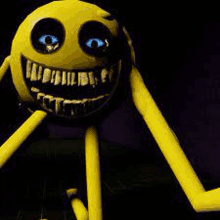 a yellow smiley face with blue eyes and teeth is sitting on a black surface .