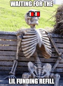 a skeleton is sitting on a wooden bench waiting for the lil funding refill .