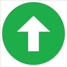 a green circle with an arrow pointing upwards