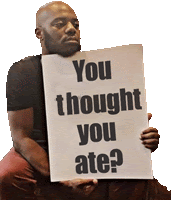 a man is holding up a sign that says you thought you ate