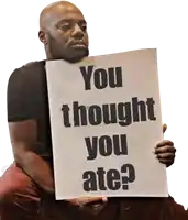 a man is holding up a sign that says you thought you ate