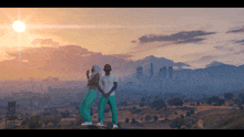 a man and a woman are standing in front of a city skyline at sunset