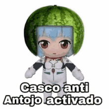 a stuffed animal with a watermelon on its head and the words `` casco anti antojo activado '' .