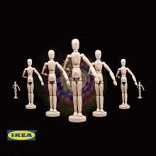 a group of wooden mannequins are standing in a circle with ikea written on the bottom