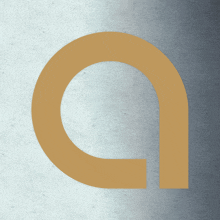 a gold letter a is against a gray background