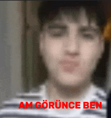 a blurry picture of a man 's face with the words am gorunce ben above him