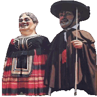 a man and a woman are standing next to each other and the woman is wearing a plaid skirt