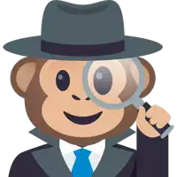 a monkey wearing a hat and tie is holding a magnifying glass